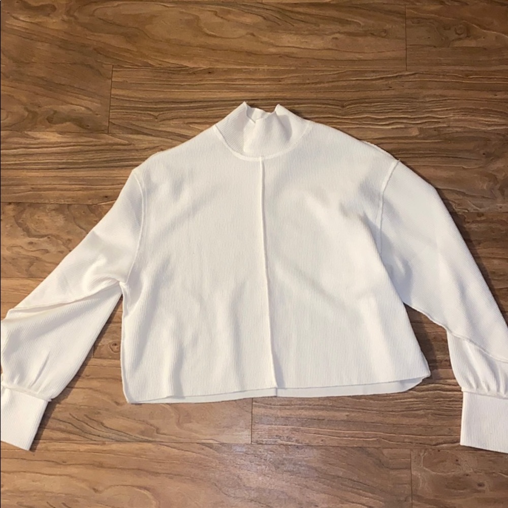 Urban Outfitters cream turtle neck sweater